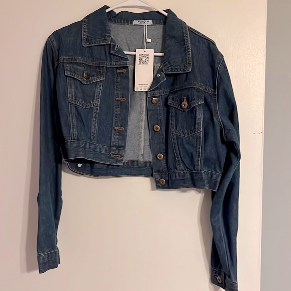 Never worn denim jacket.